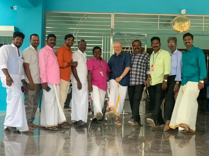 Teachers from Saint Antony school online with the president of the association for a group photo