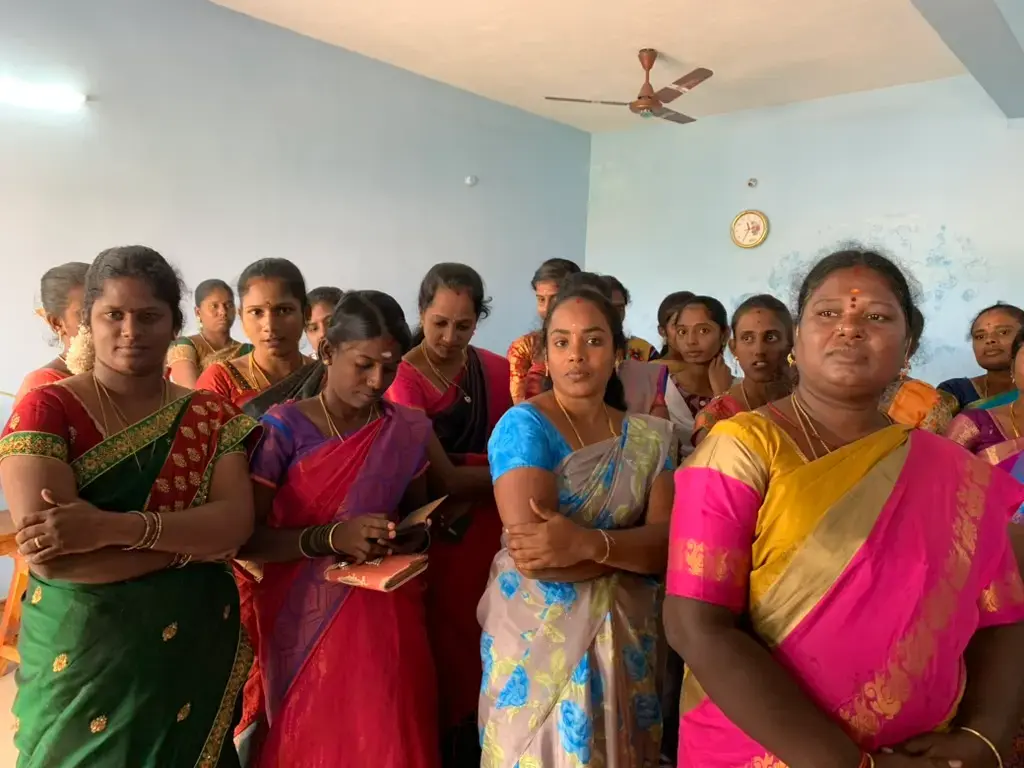 Gathering of female teachers in a classroom at Saint Antony school