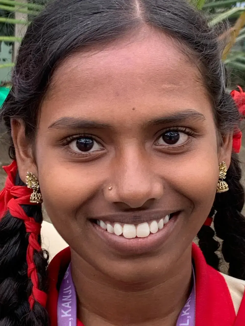 Photo of a smiling student from Saint Antony school